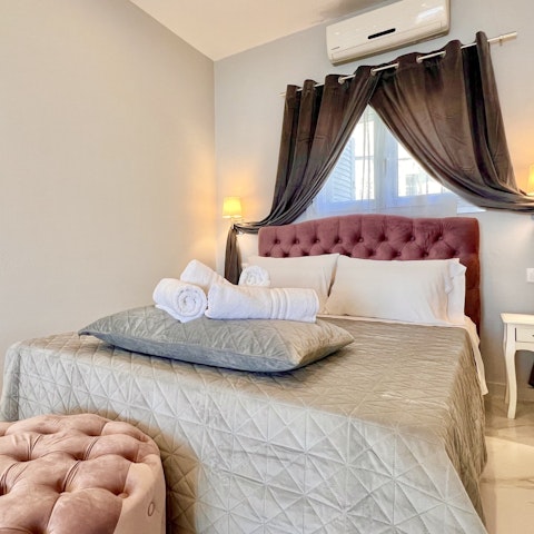 Get a good night's rest in the comfy and elegant bedroom