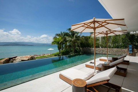 Stretch out beside the pool as the sea fills the horizon