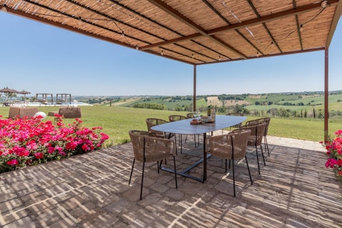 Gather on the shaded terrace to share special meals and scenic views