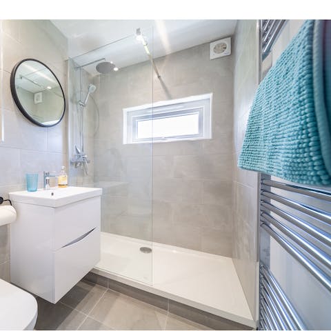 Wash away a day on the beach in the generous walk-in shower