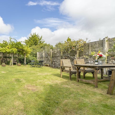Soak up the sunshine in the large communal garden