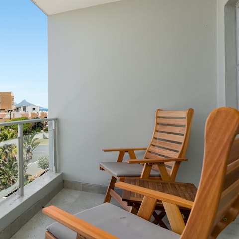 Sip sundowners on the private balcony as you unwind for the day