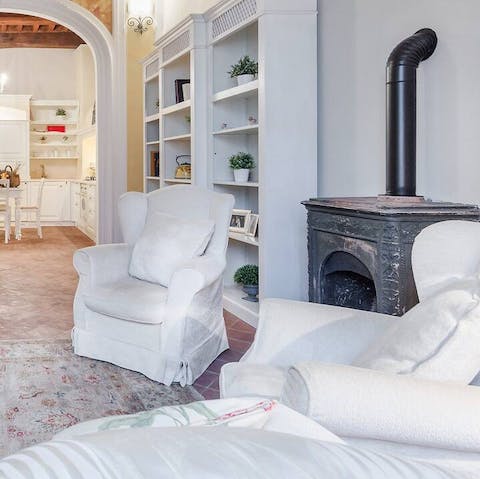 Settle into a cosy armchair with a book at the end of the day