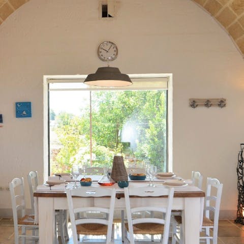 Enjoy a glass of Italian wine at the dining table