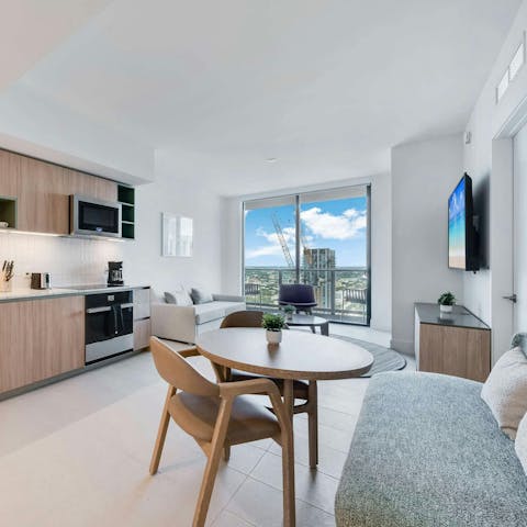 Cook, dine and relax in the stylish open-plan living space