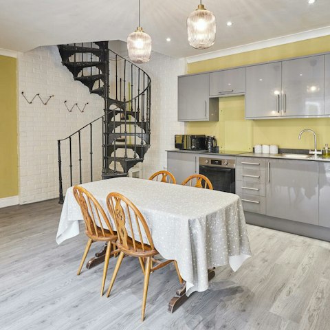 Enjoy takeaway fish and chips at the dining table