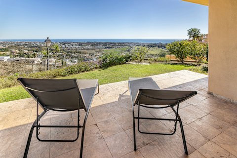 Stretch out on the terrace as the coastline unfolds below
