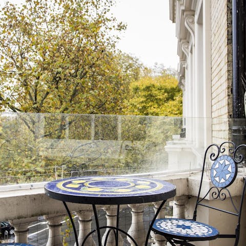 Take in leafy views from your private balcony