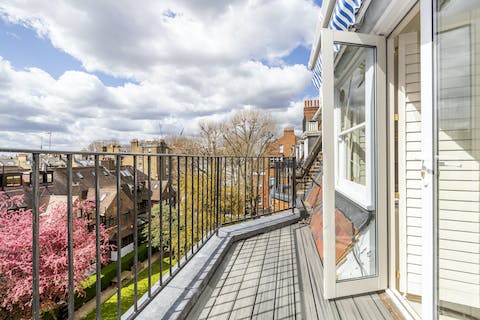 Enjoy your morning cup of tea on the balcony while taking in views of Chelsea