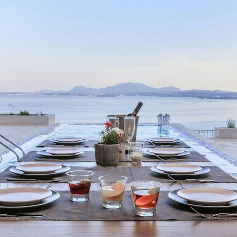 Savour the views and drinks served on the terrace