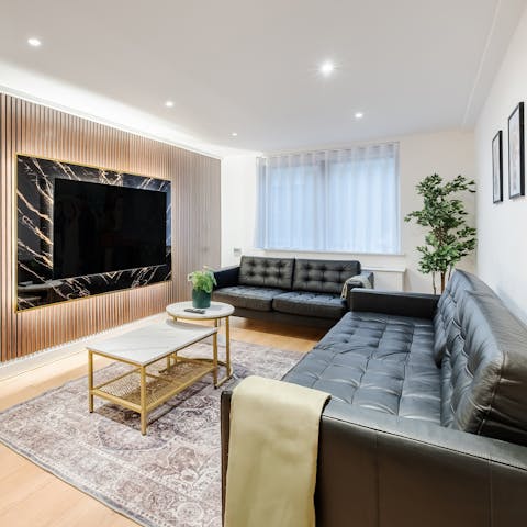 Relax on the sofa in front of the widescreen TV