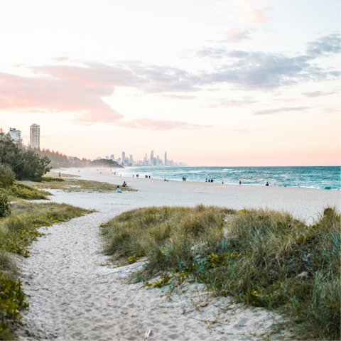 Stroll along Burleigh Beach – just 450 metres away