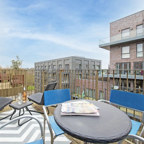 Unwind after a busy day with a glass of wine on the balcony