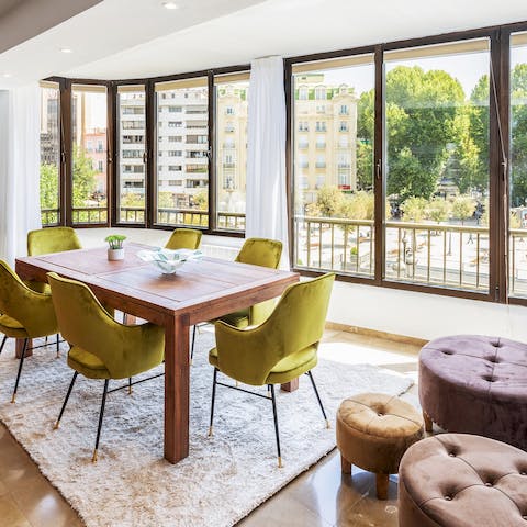 Serve up a fancy dinner on the table next to the large windows