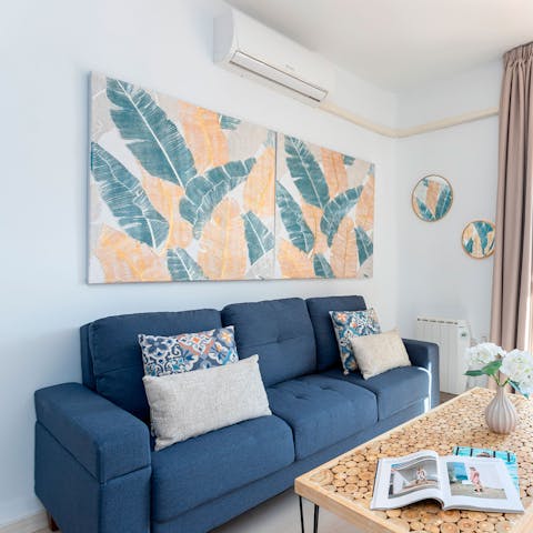 Stretch out in the living area after a fun-filled day out in the city
