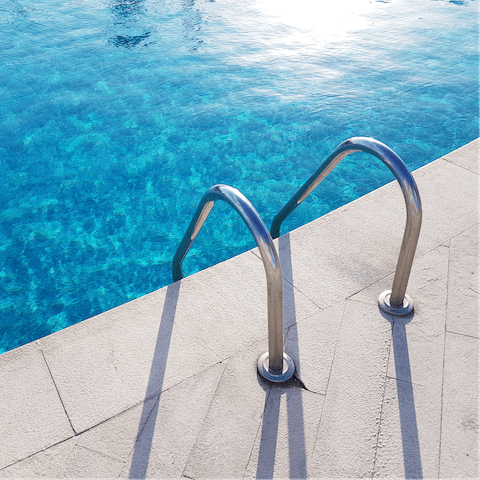 Cool off on hot afternoons in the communal outdoor pool
