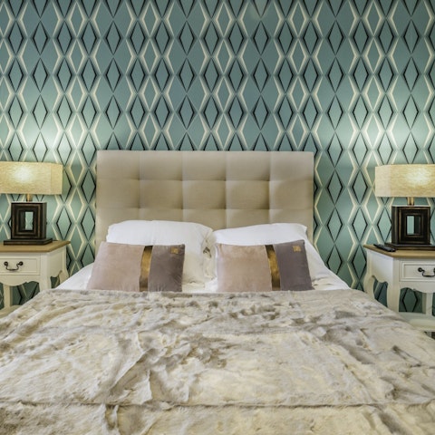 Relax on the bed after exploring Madrid