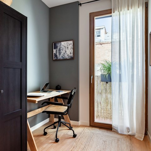 Work remotely in style in the sunny office room
