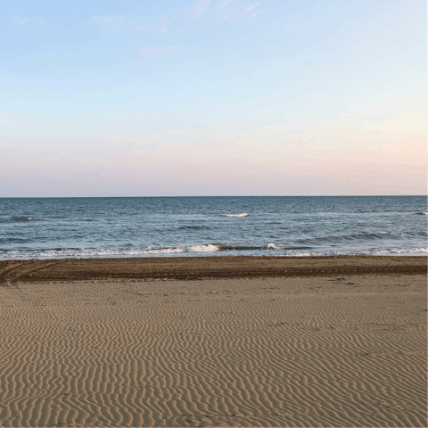 Stroll along Plage de la Badine, five-minute drive away