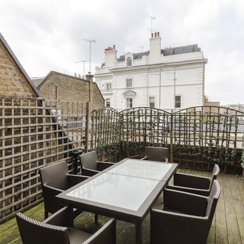 Spend sunny days out on the roof terrace – it's the perfect spot to share a bottle of wine in the evenings
