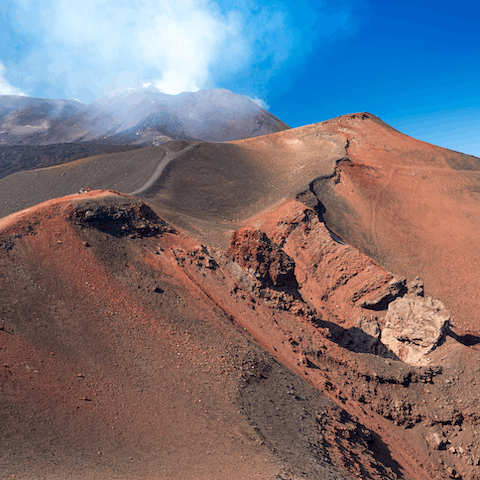 Drive to the border of the Parco dell'Etna in twenty minutes to set off on a hike