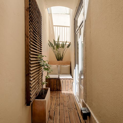 Start your days with coffee on the compact but cute wrap-around patio