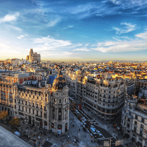 Explore the vibrant city of Madrid from your location in elegant Justicia