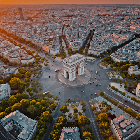 Soak up the vibrant heart of Paris while strolling to the Arc de Triomphe