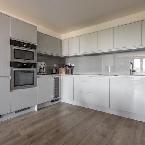 Cook up your favourite dishes in the spacious kitchen