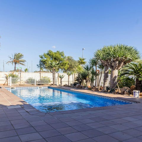 Spend slow afternoons relaxing by the private pool
