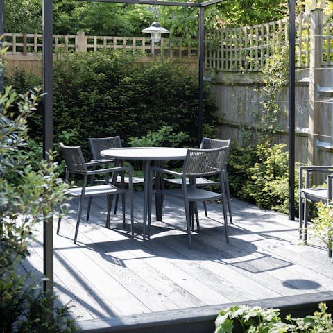 Enjoy a spot of alfresco dining on the sun-kissed terrace