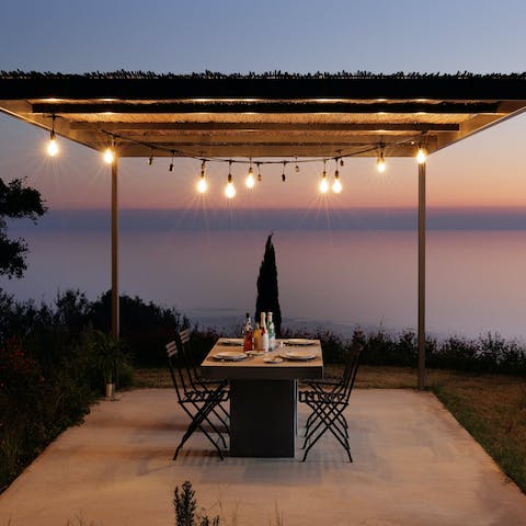 Gather on the terrace for a Grecian feast as the sun sets
