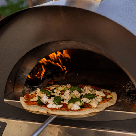 Fire up the pizza oven and nibble on a homemade Margherita