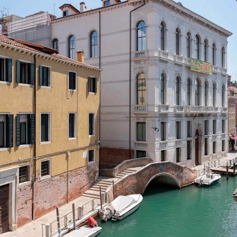 Watch gondolas drift by from the apartment's windows