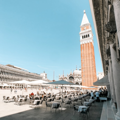 Find a sunny spot for people watching at St Mark's Square