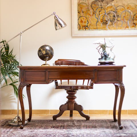 Catch up on emails at the antique desk