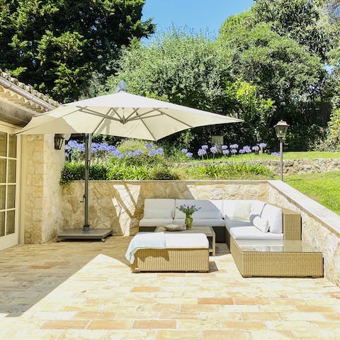 Relax in the sunshine with a glass of French wine in hand