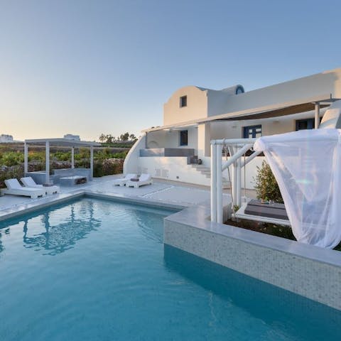 Immerse yourself in the idyllic beauty of Santorini from this home in Megalochori