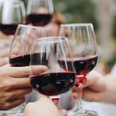 Sip a glass of wine upon arrival, courtesy of your generous host