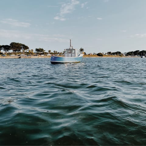Drive fifteen minutes to Sandbanks beach or hop on a pleasure boat