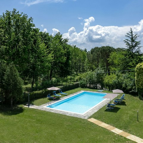 Embrace total relaxation while lounging by the pool