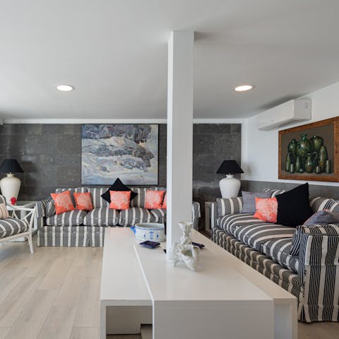 Cool off with a good book in the light-filled living room