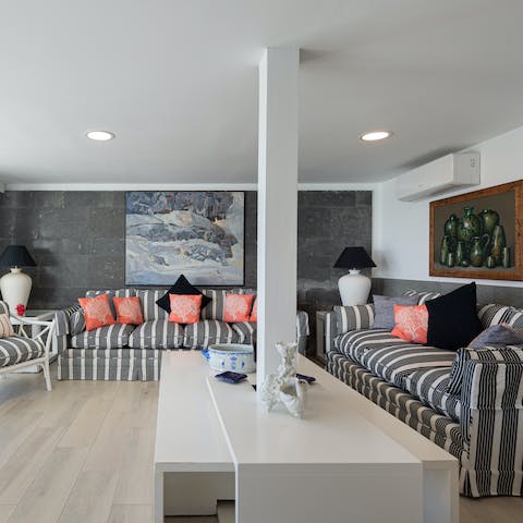 Cool off with a good book in the light-filled living room