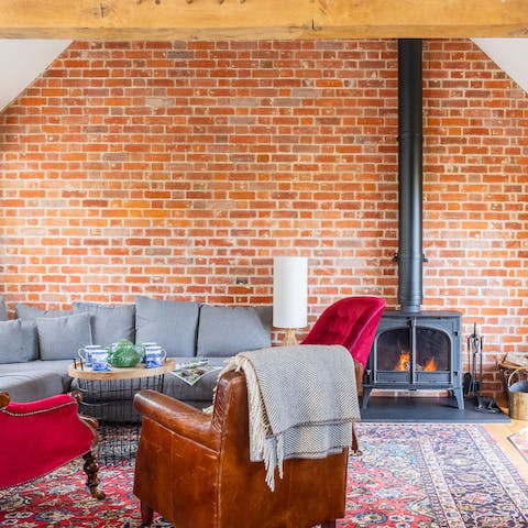 Warm yourself by the cosy fireplace after a long day