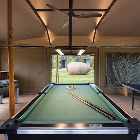 Play a game of billiards or table tennis here in the games room, shaded from the Italian sun