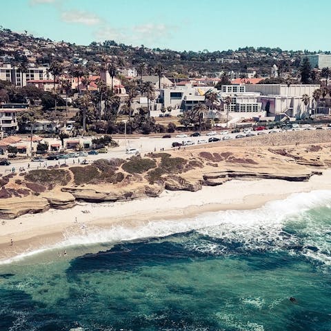 Step into your own private paradise from this home in La Jolla Shores