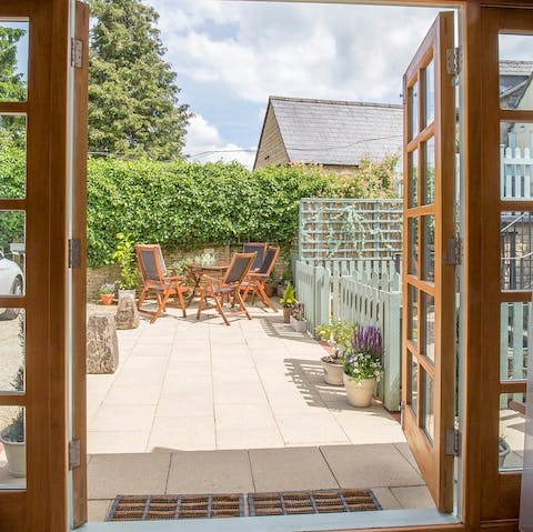 Have a secluded evening drink in the walled patio garden