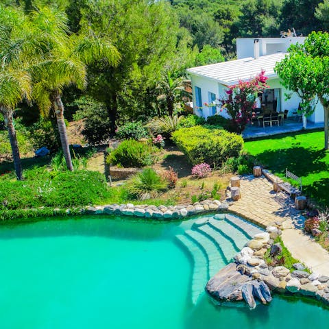 Cool off from the Spanish heat in the private lake pool