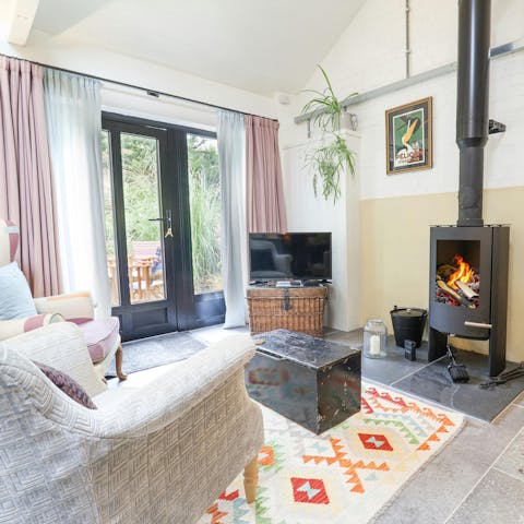 Curl up around the wood-burning stove after days of hiking