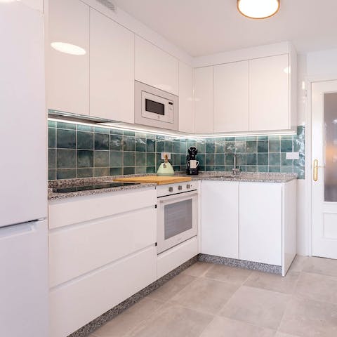 Rustle up tapas for dinner in the cosy but well-equipped kitchen